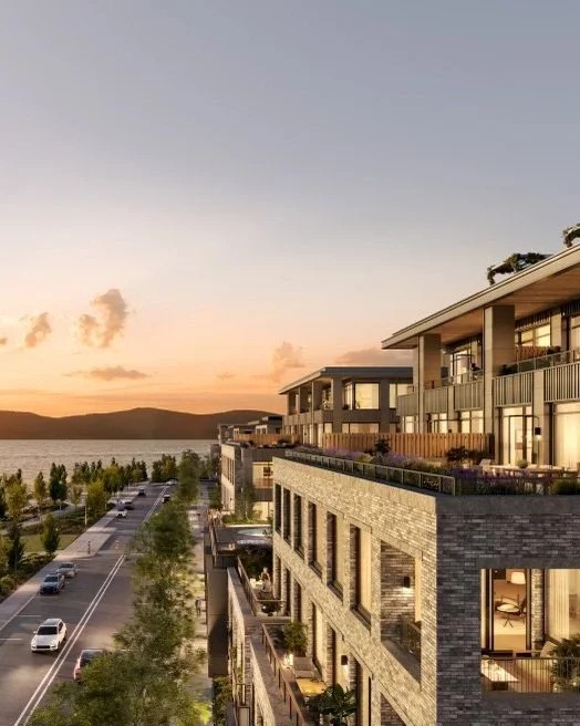 Modern multifamily residential building at sunset